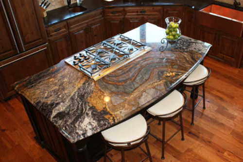 Kitchen with granite island and countertops